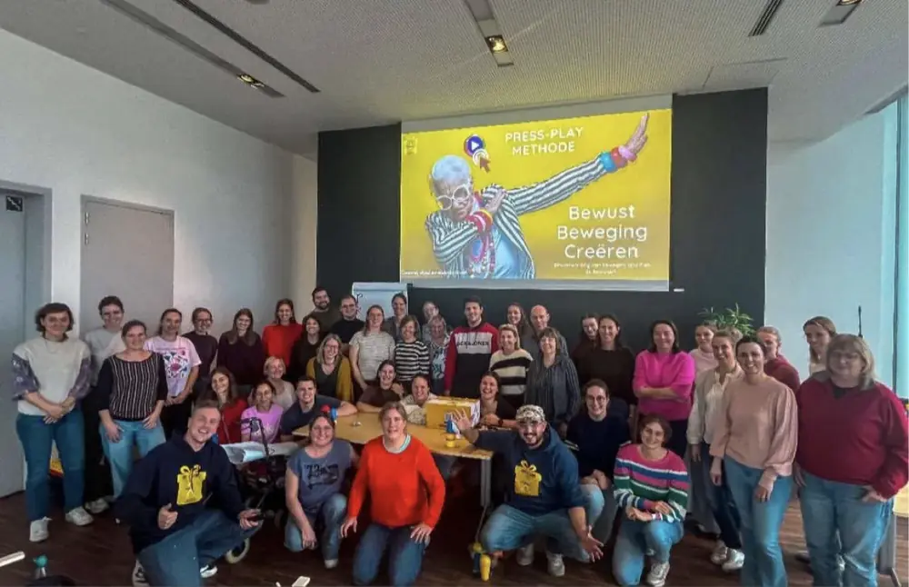 Grote groep deelnemers na een training